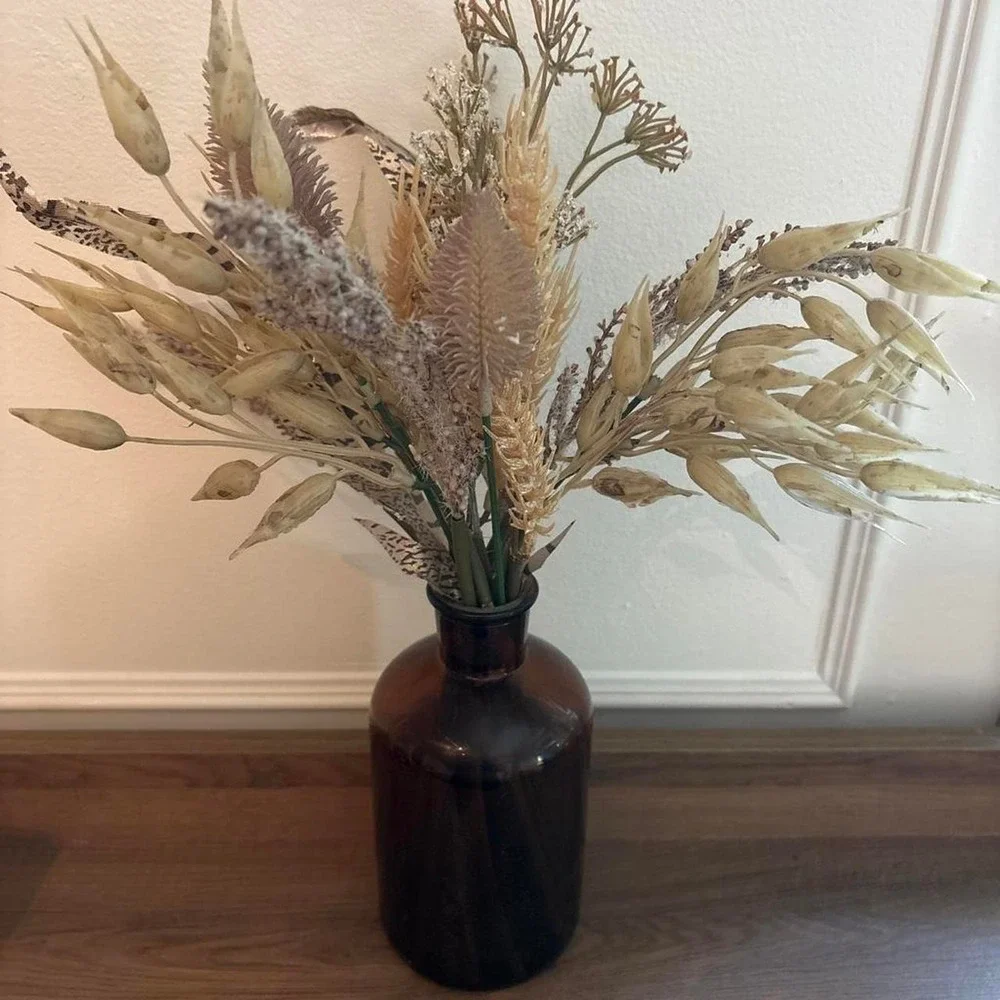 Brown glass vase with fake dried flowers Glass is 7